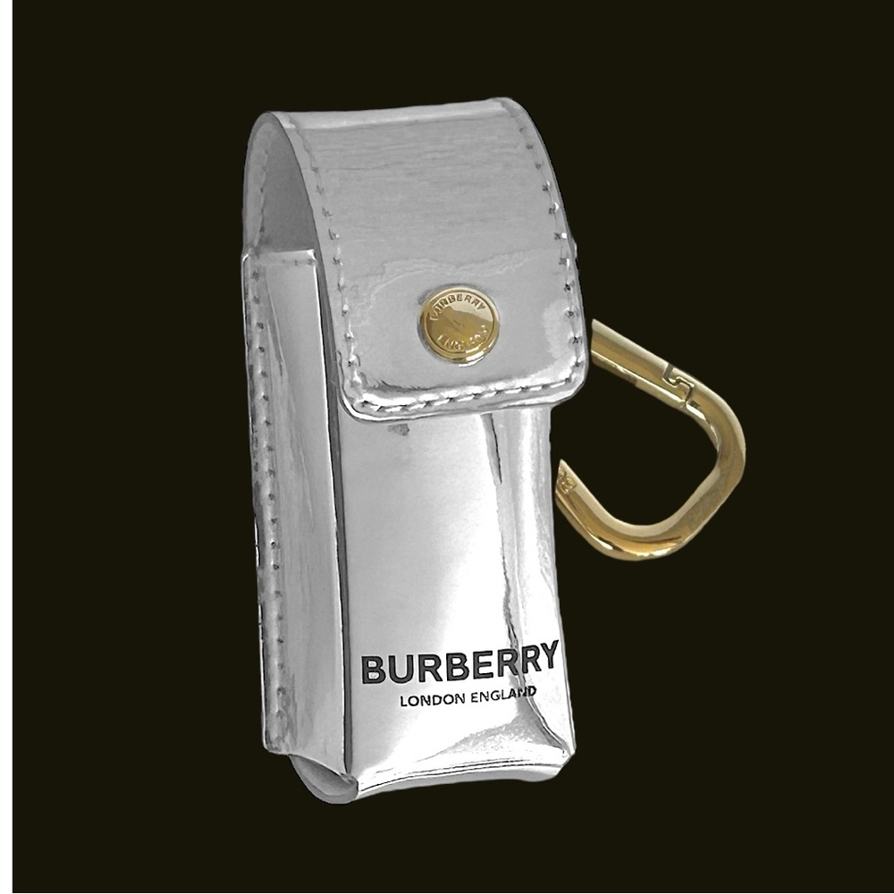 BURBERRY Silver Snap Case With Gold Spring Link